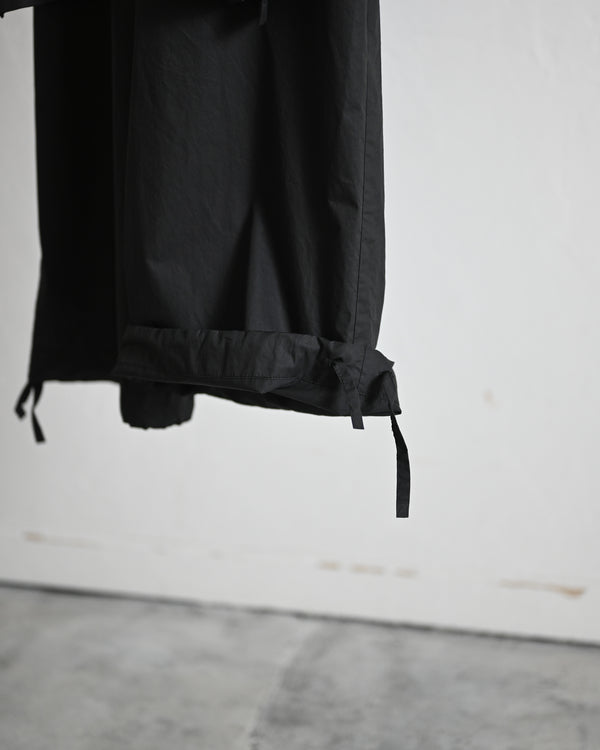 Holding Trousers