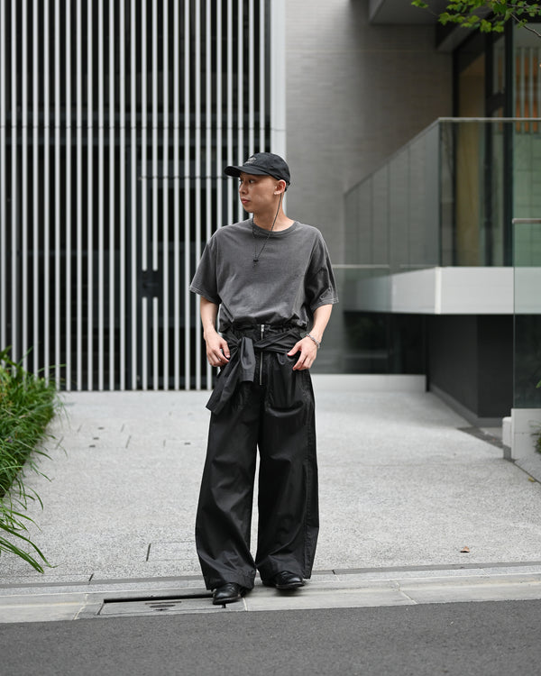 Holding Trousers