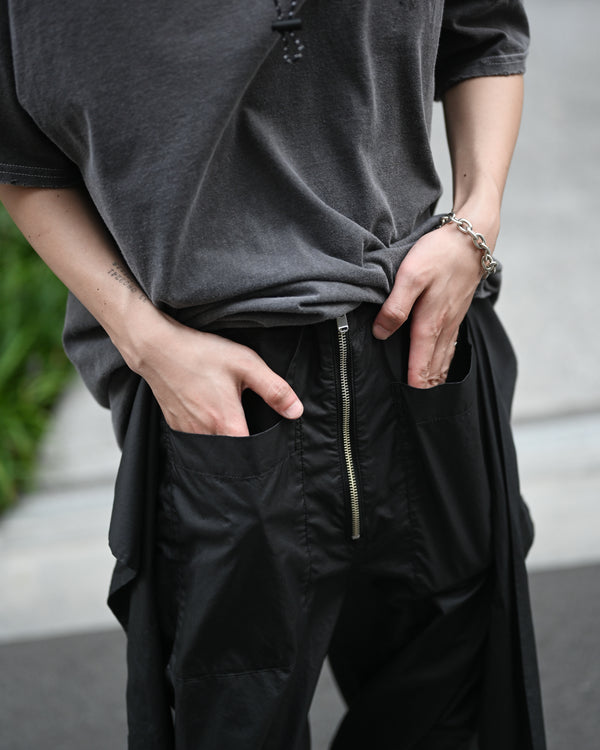 Holding Trousers