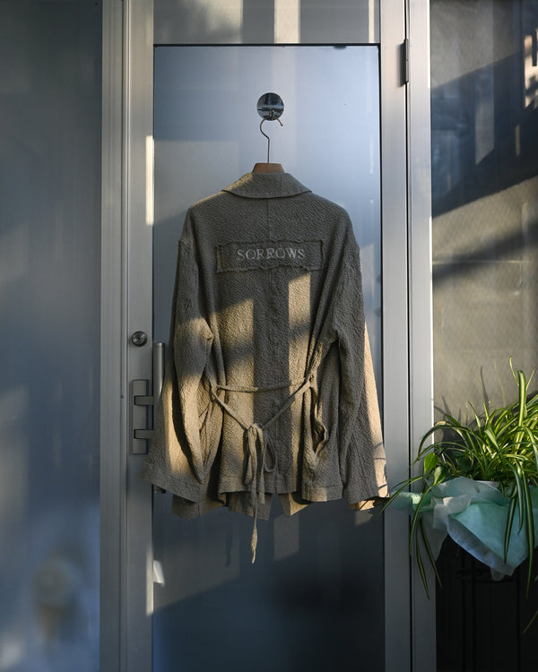 Shrink Dust Jacket with SORROWS, beige